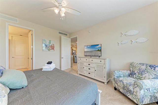 bedroom featuring light carpet and ceiling fan