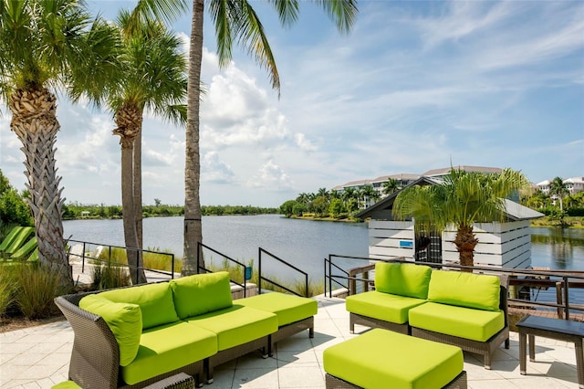 view of patio / terrace featuring outdoor lounge area and a water view