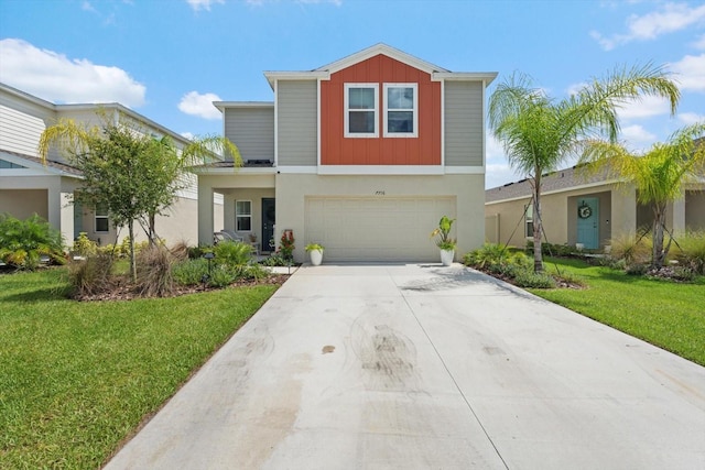 view of front of property featuring a front lawn and a garage