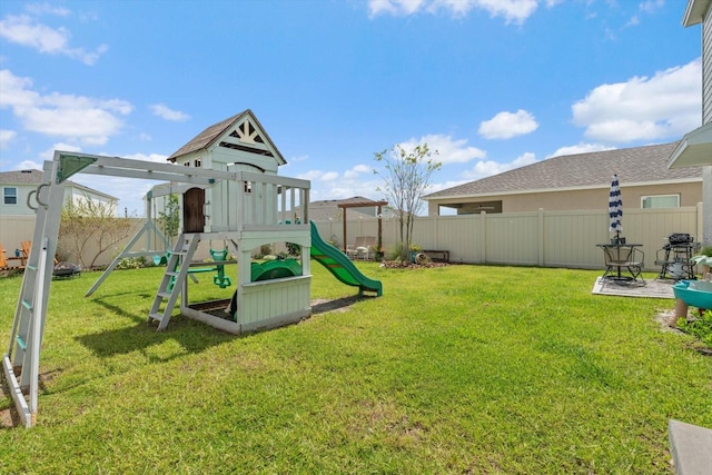 view of playground featuring a lawn