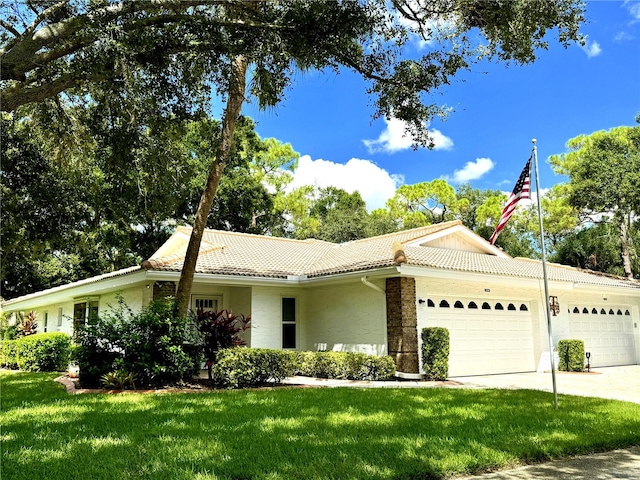 ranch-style house with a front lawn and a garage