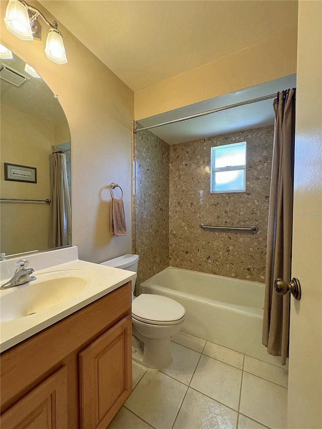 full bathroom with shower / tub combo with curtain, tile patterned flooring, vanity, and toilet