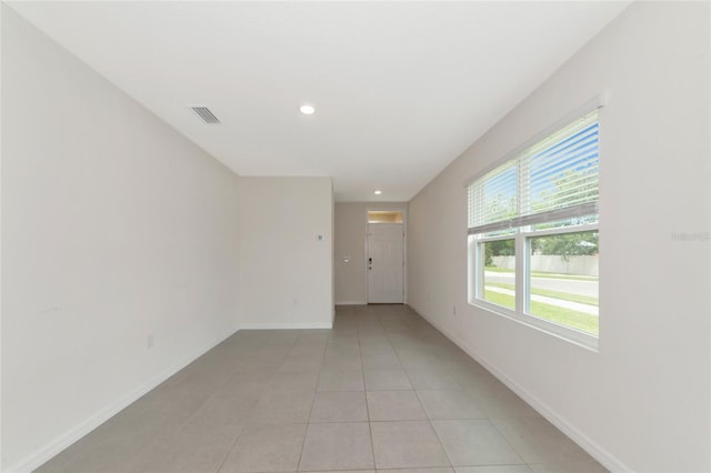 view of tiled spare room