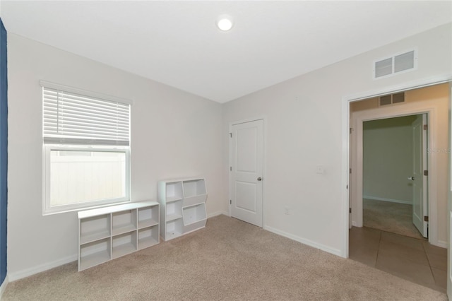 view of carpeted spare room