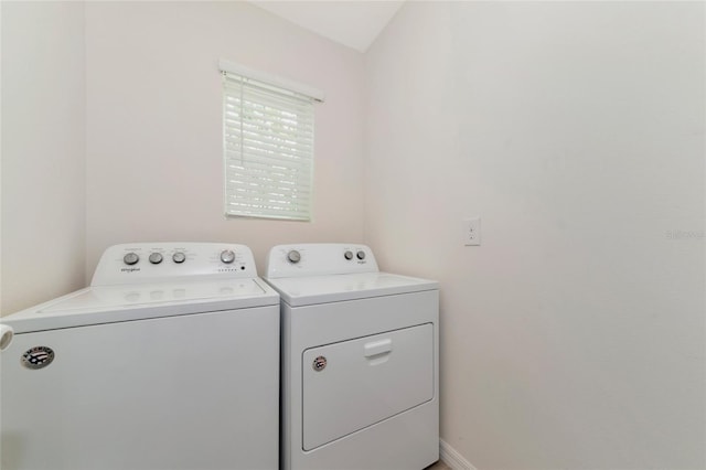 washroom featuring independent washer and dryer