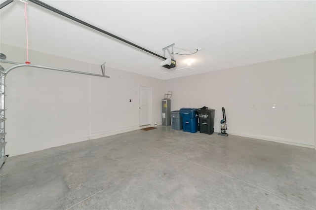 garage with electric water heater and a garage door opener