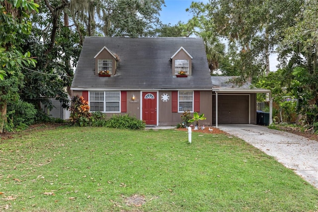 view of front facade featuring a front lawn and a garage