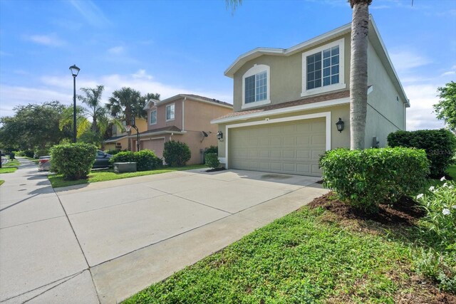 front of property featuring a garage