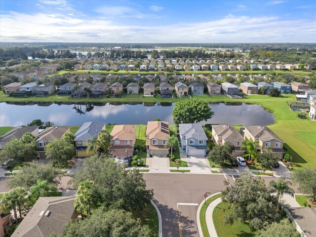 drone / aerial view with a water view