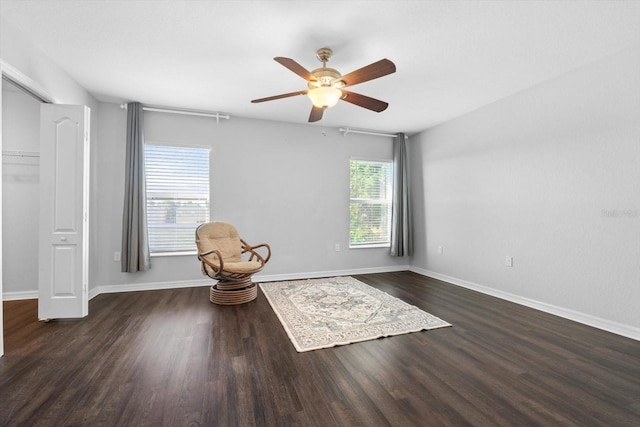 unfurnished room featuring dark hardwood / wood-style flooring and ceiling fan