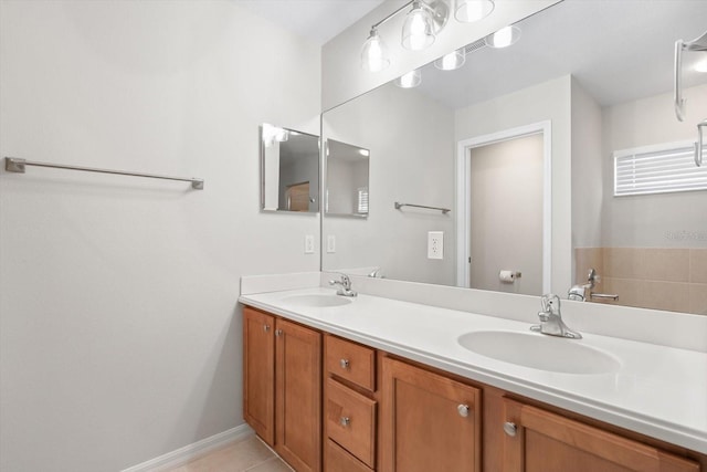 bathroom featuring vanity and tile patterned flooring