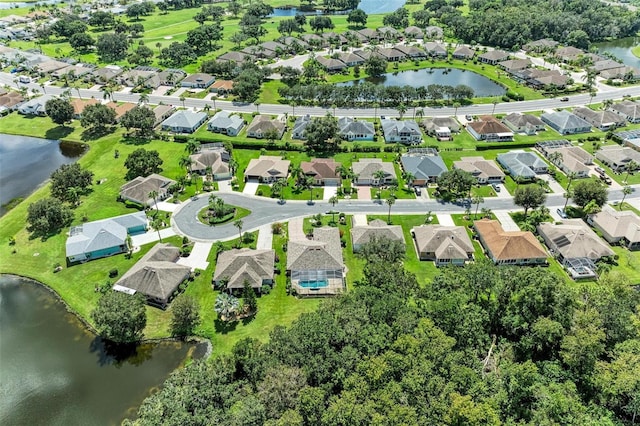 drone / aerial view with a water view