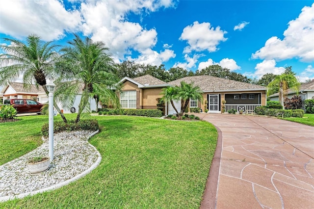 ranch-style home with a front yard