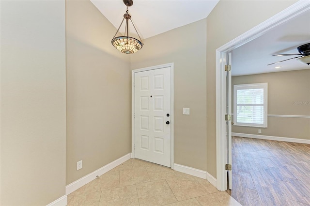 entrance foyer featuring light hardwood / wood-style floors and ceiling fan