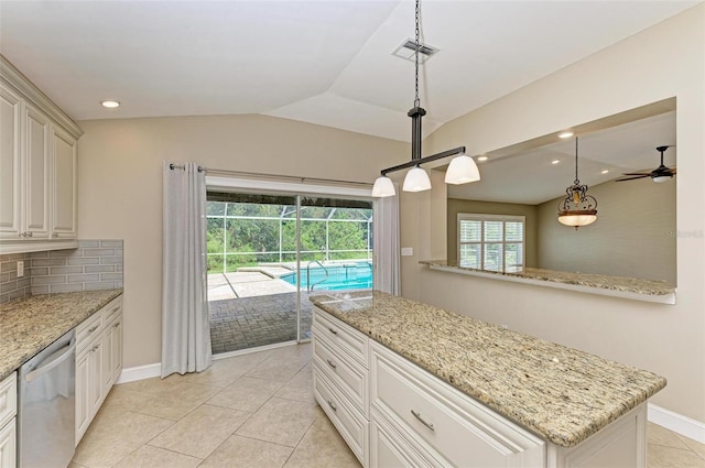 kitchen featuring decorative backsplash, light stone countertops, stainless steel dishwasher, ceiling fan, and decorative light fixtures