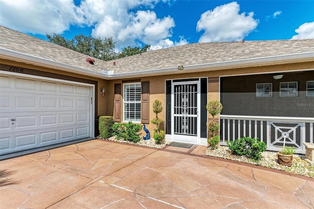 entrance to property with a garage