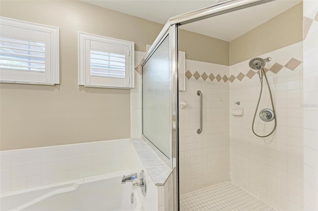 bathroom with independent shower and bath