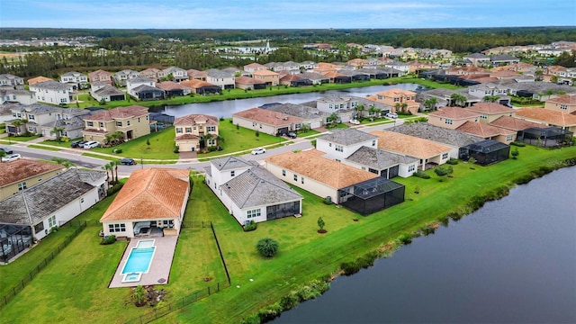 drone / aerial view with a water view