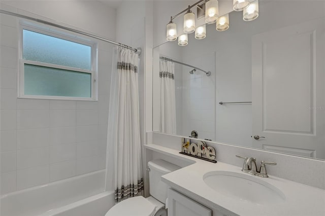 full bathroom featuring shower / bath combination with curtain, toilet, and vanity