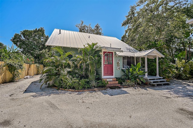 1677 4th St, Sarasota, FL 34236 - view of front of property with metal roof and fence