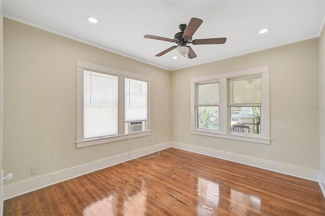 unfurnished room featuring ornamental molding, wood-type flooring, and ceiling fan