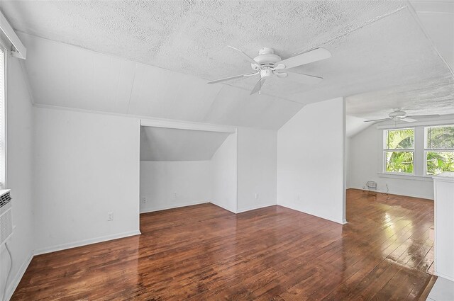 1677 4th St, Sarasota, FL 34236 - bonus room with wood-type flooring, a ceiling fan, vaulted ceiling, and a textured ceiling