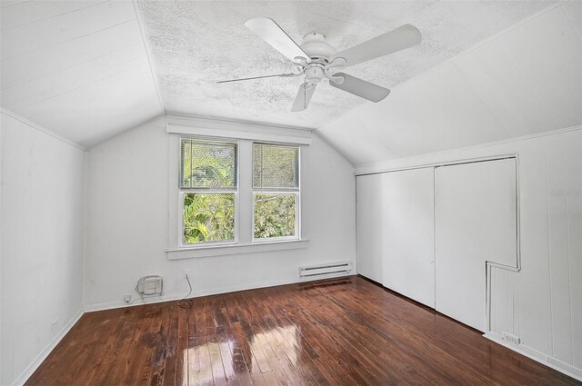 1677 4th St, Sarasota, FL 34236 - bonus room with a textured ceiling, a ceiling fan, vaulted ceiling, hardwood / wood-style floors, and a baseboard heating unit