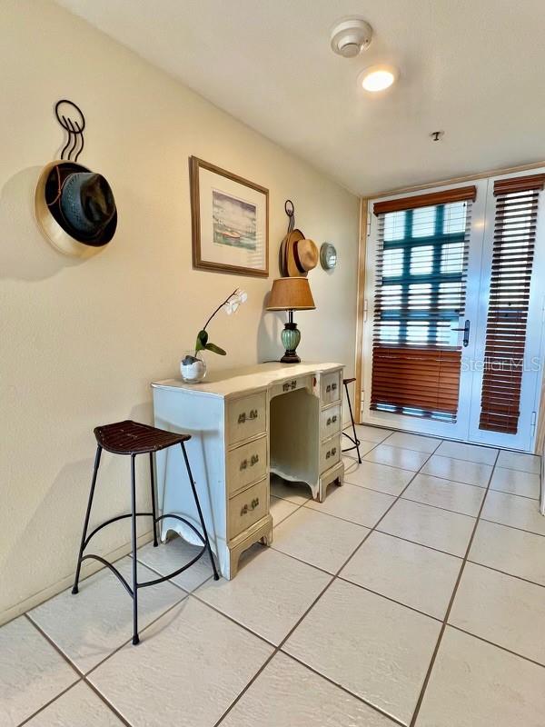 office space featuring light tile patterned floors