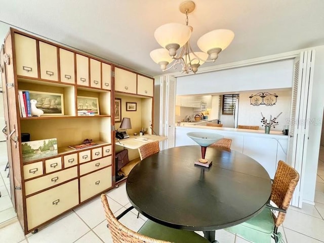 tiled dining space with a notable chandelier