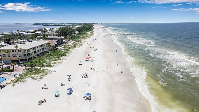 aerial view featuring a view of the beach and a water view