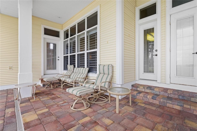 view of patio featuring a porch