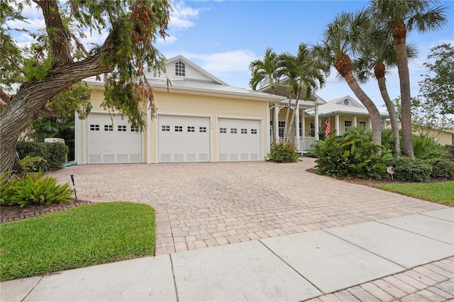 ranch-style house featuring a garage