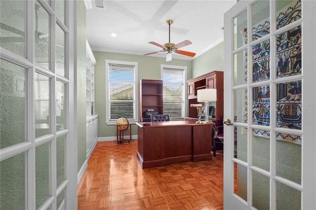 home office with baseboards, french doors, a ceiling fan, and crown molding