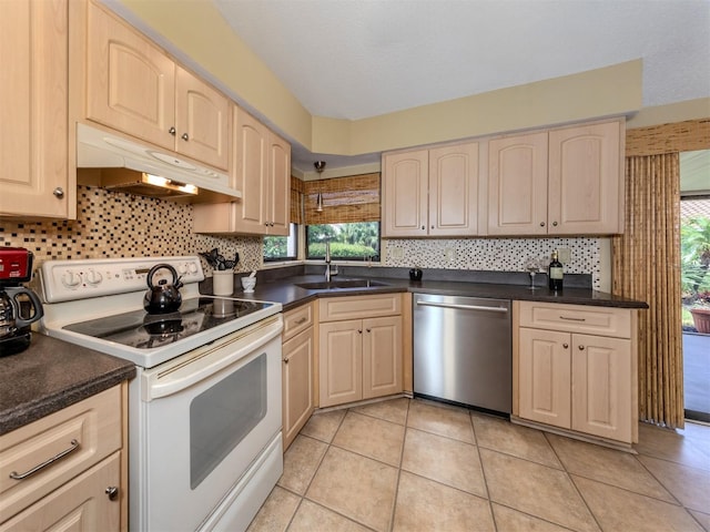 kitchen featuring white electric range oven, light tile patterned floors, sink, stainless steel dishwasher, and backsplash