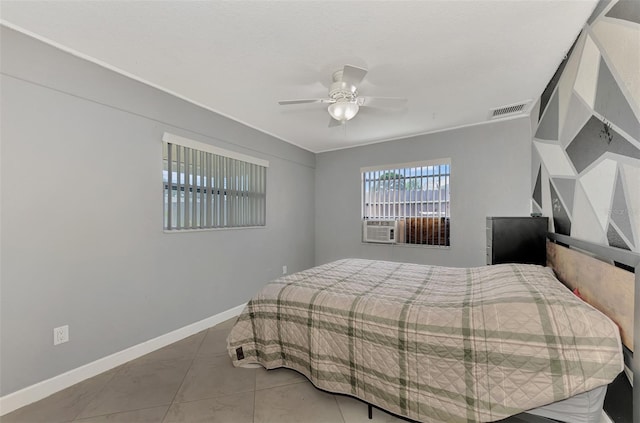 tiled bedroom featuring cooling unit and ceiling fan