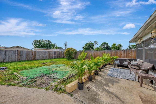 view of yard with a patio and an outdoor living space