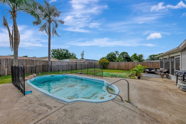 view of pool featuring a patio