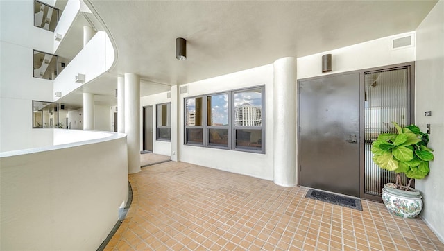 1255 N Gulfstream Ave Unit 1003, Sarasota, FL 34236 - doorway to property featuring stucco siding