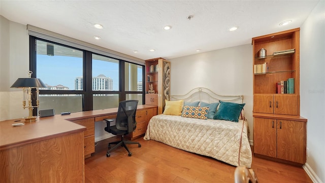 bedroom featuring light hardwood / wood-style flooring