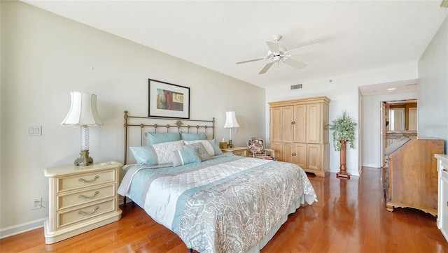 bedroom featuring ceiling fan and hardwood / wood-style flooring