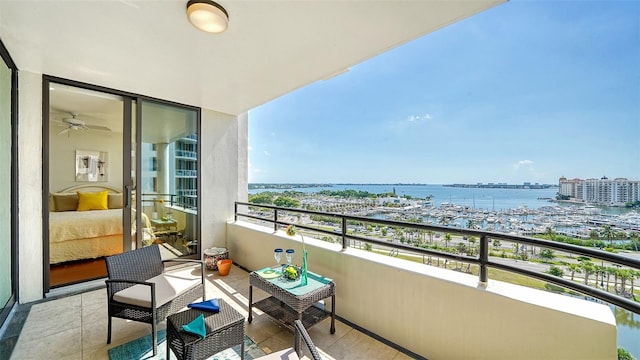 balcony featuring a water view