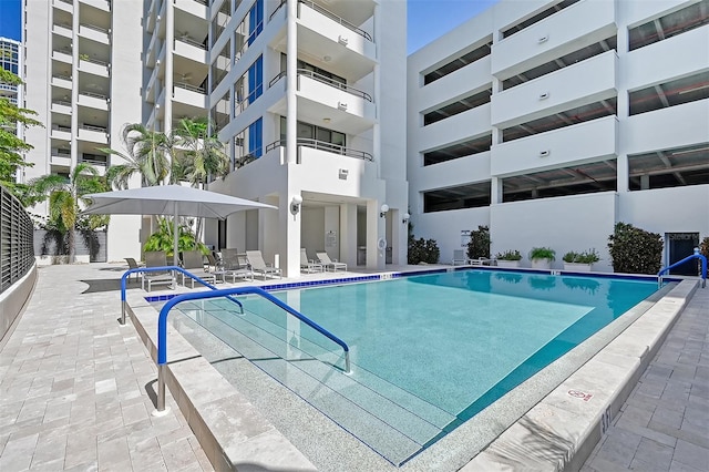 view of pool featuring a patio area