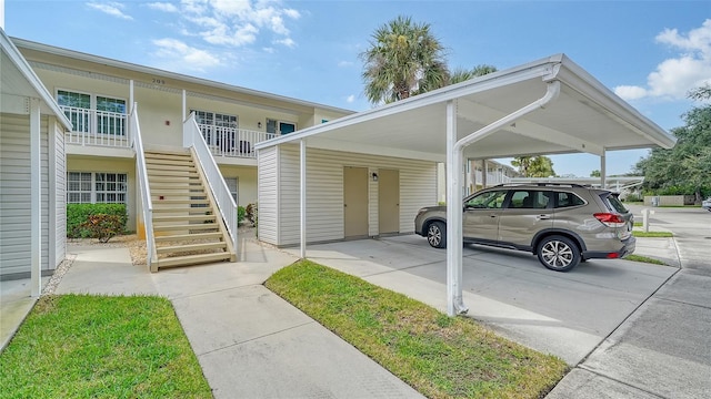 exterior space featuring a carport