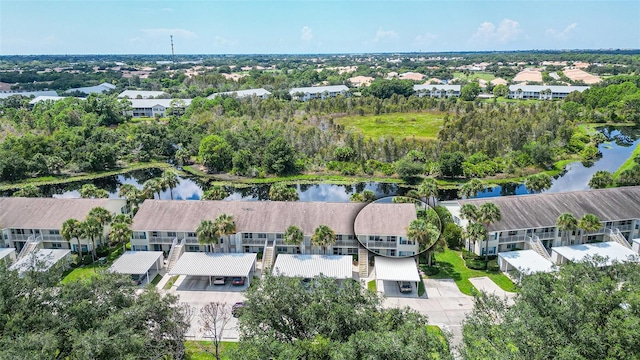 bird's eye view with a water view