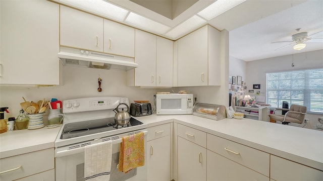 kitchen featuring white appliances and ceiling fan