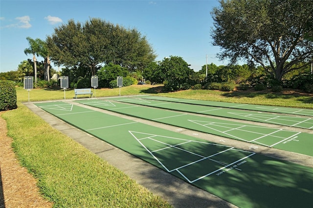 view of community featuring a lawn