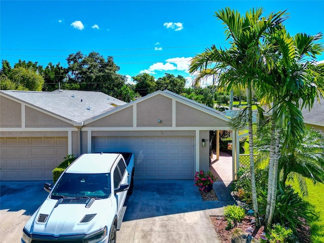 single story home featuring a garage