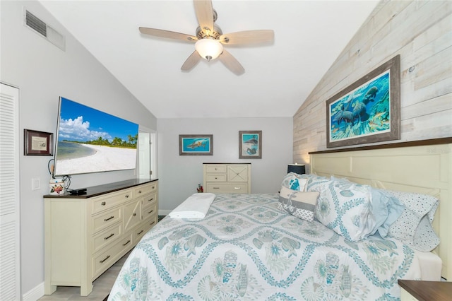 bedroom with lofted ceiling and ceiling fan