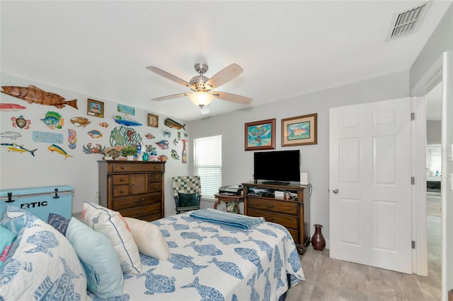 bedroom featuring light hardwood / wood-style flooring and ceiling fan