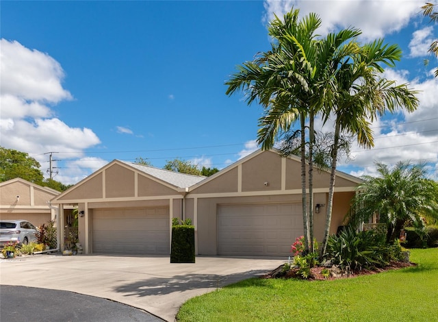 single story home featuring a garage